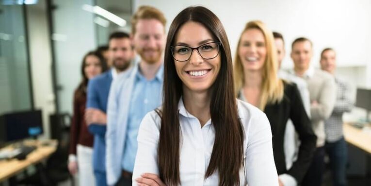 portrait of successful business team posing in office FEATURED IMAGE