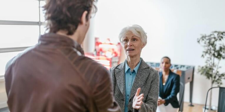 An Elderly Woman in a Business Meeting FEATURED IMAGE