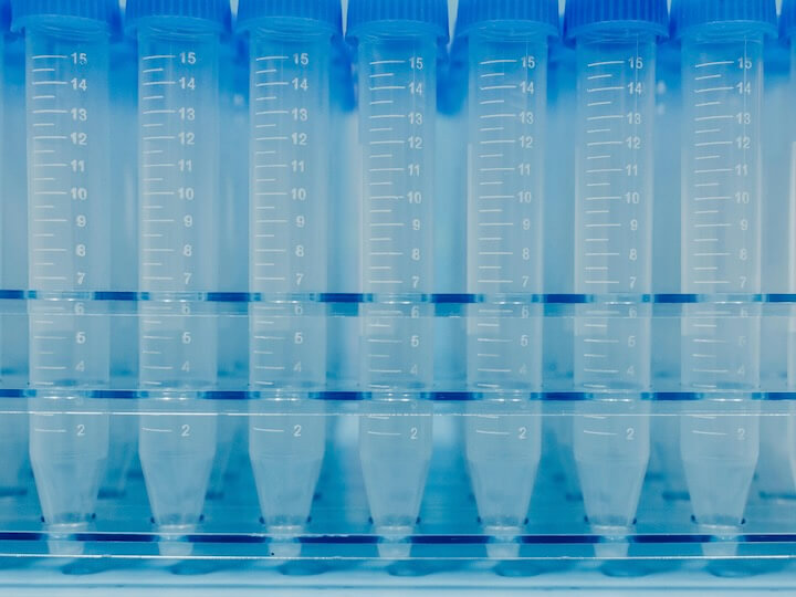 Clear Glass Bottles With Orange Liquid Inside