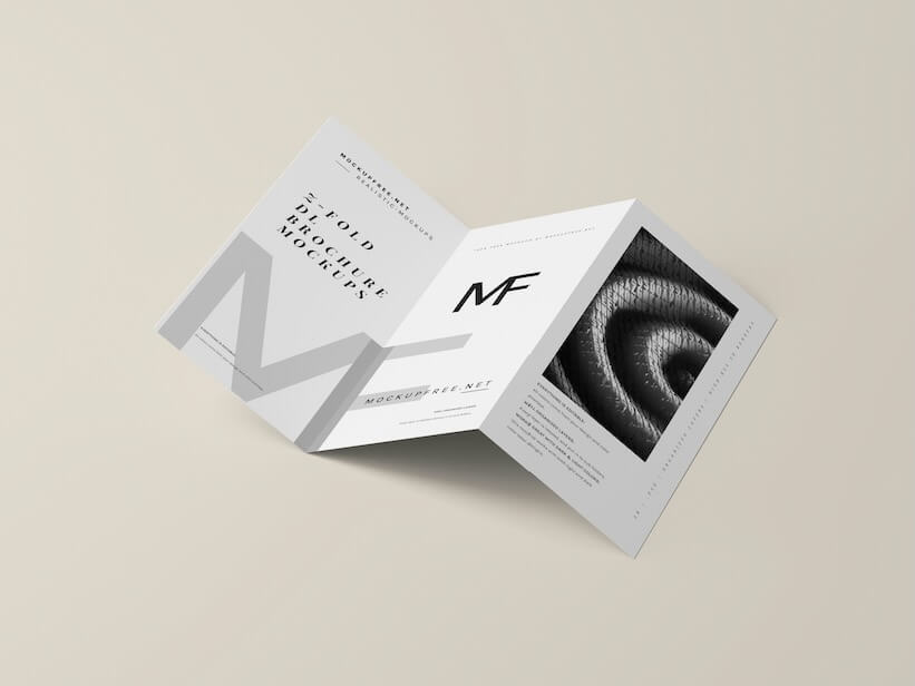 a folded brochure with a black and white image