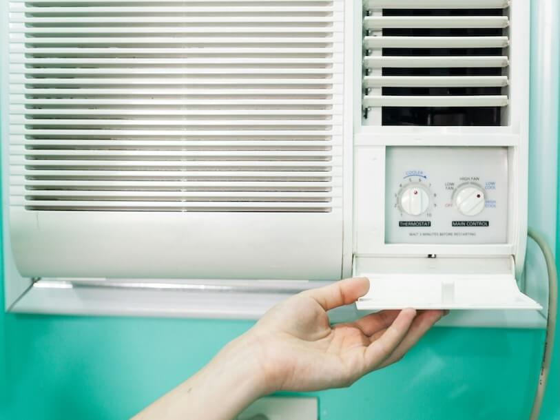 open panel adjustment of a small room air conditioner