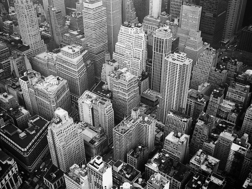 Aerial View and Grayscale Photography of High-rise Buildings