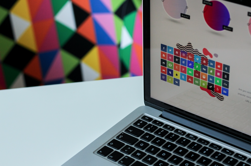 silver laptop computer with assorted logo screengrab