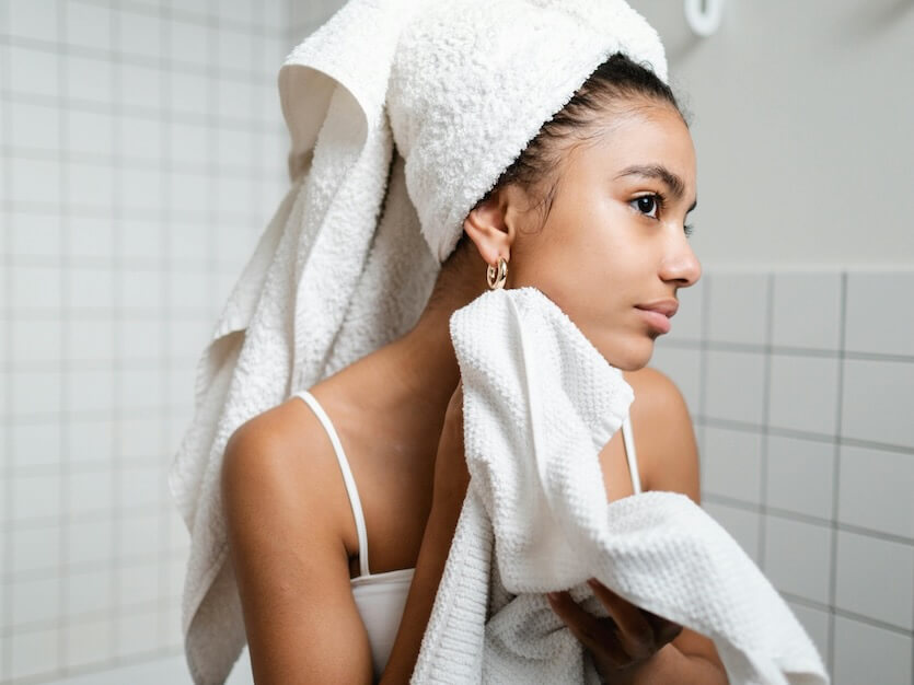 Woman in White Tank Top With Fresh Skin
