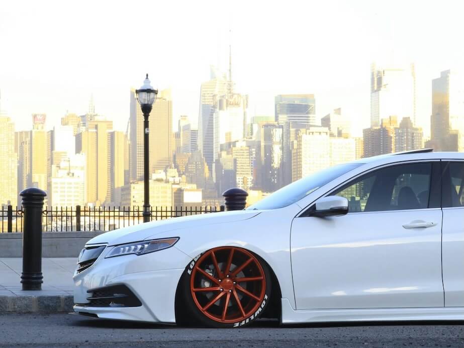 White Car Parking on the Road at Daytime