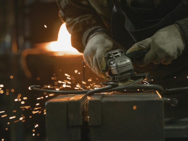 Person Holding Black and Gray Electronic Device