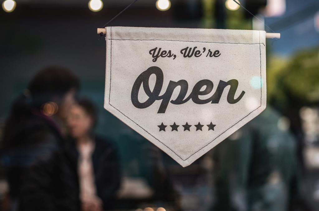 Shallow Focus Photo of White Open Sigange