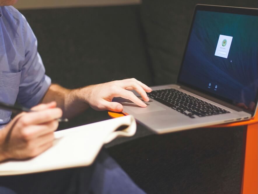 Man Using Macbook