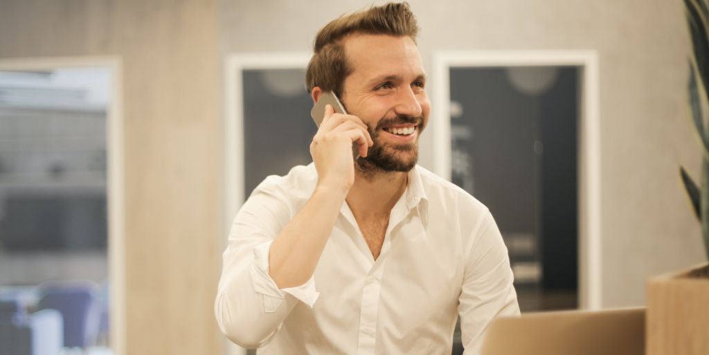 man using smartphone on chair FEATURED IMAGE