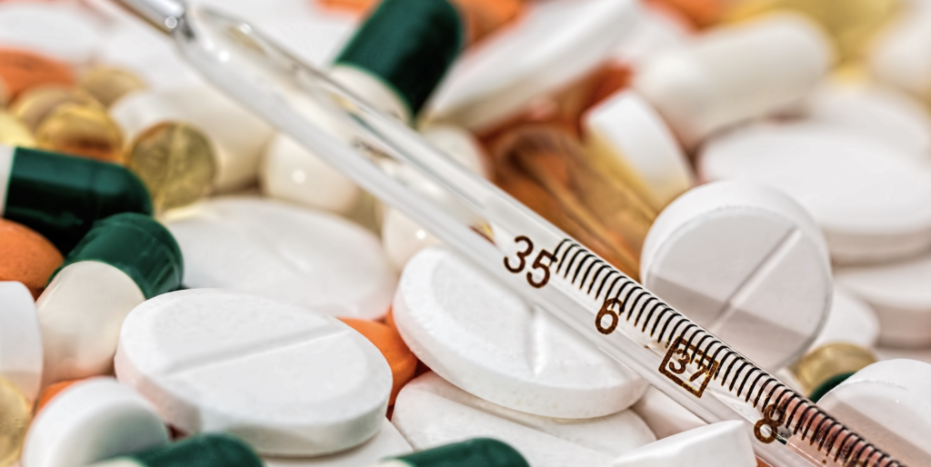 Thermometer on Medical Pills Featured Image