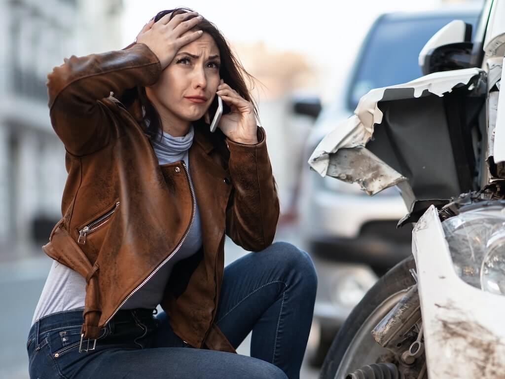 frustrated woman after a traffic incident
