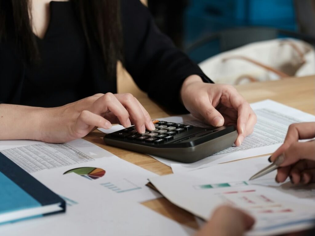 business people analyzing statistics business documents financial concept