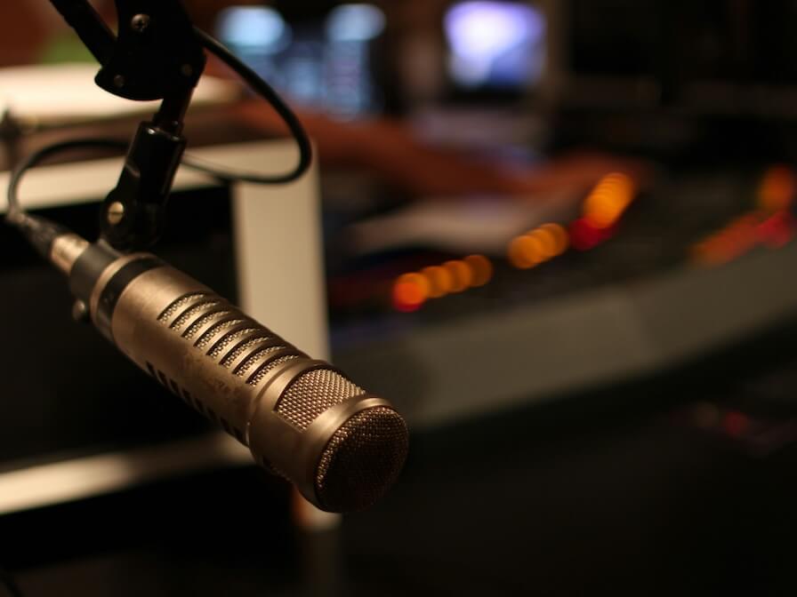 black and gray microphone with stand