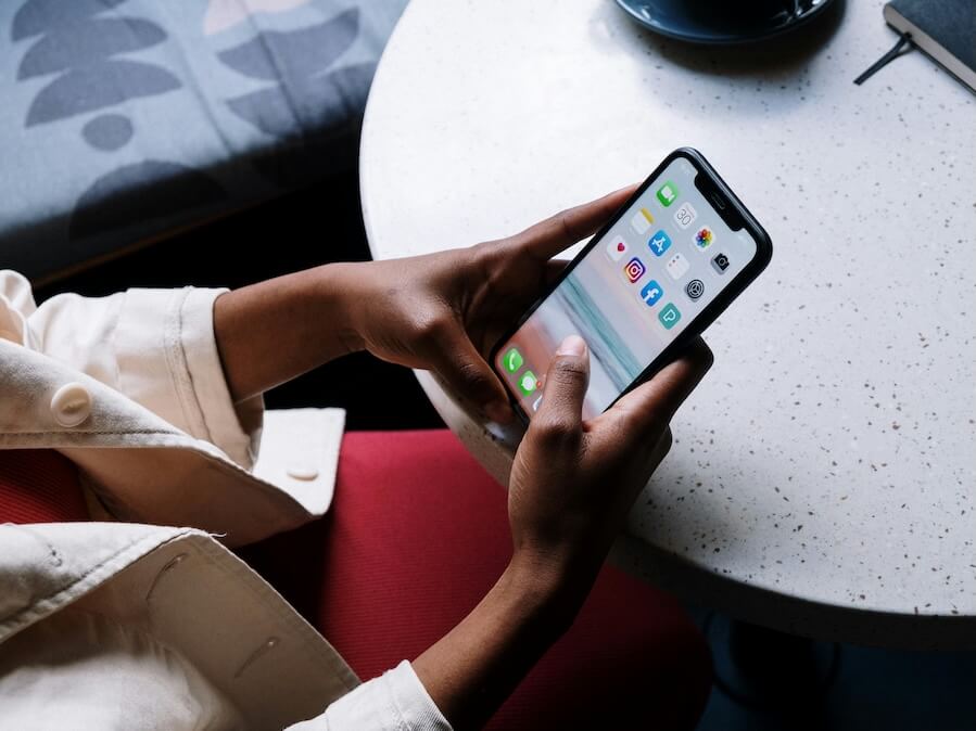 Person Holding Black Iphone 5