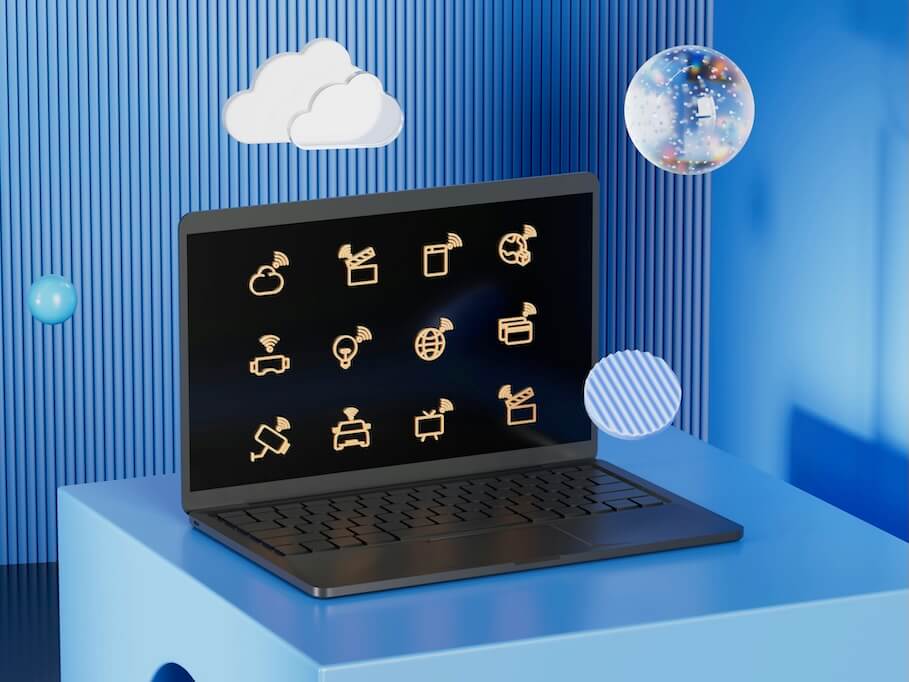 a laptop computer sitting on top of a blue table
