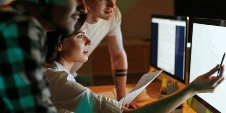 programmers working on software in office team of people coding new app high resolution FEATURED IMAGE