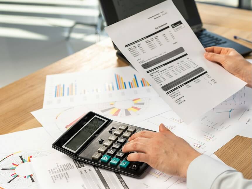cropped photo of secretary hands accounting advisor employee-employer-employment entrepreneur in formal wear shirt she sit behind desk in light loft interior check cost tax