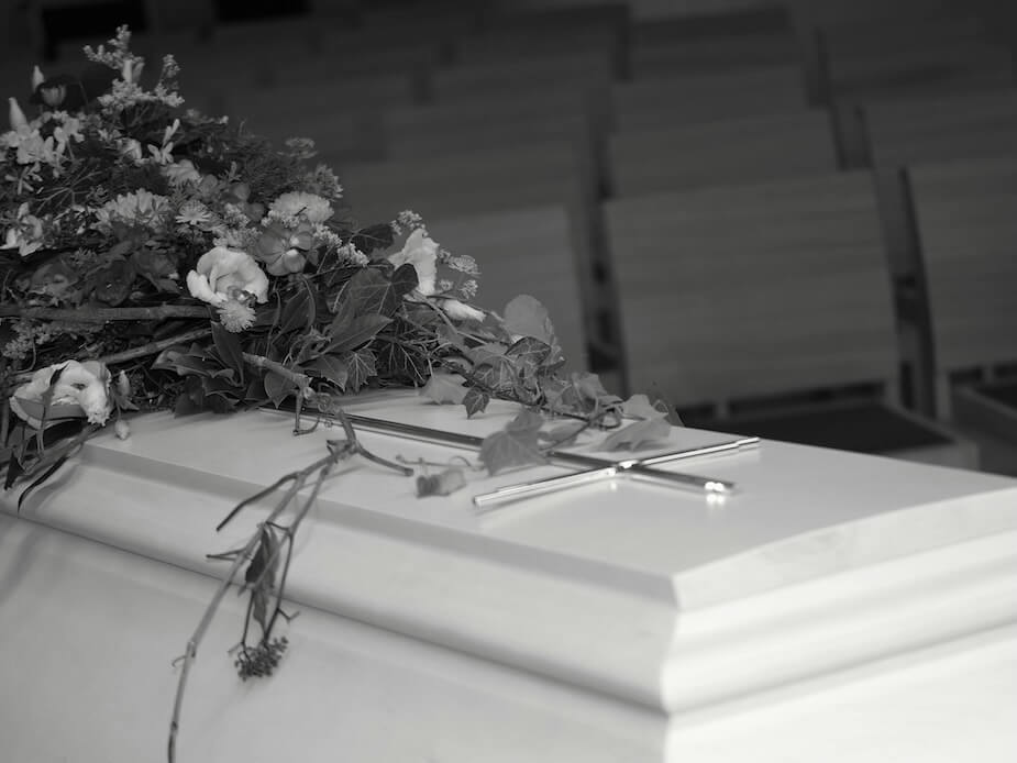 Grayscale Photo of a Coffin