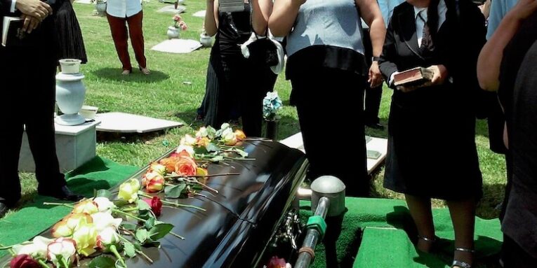 group of people attending burial FEATURED IMAGE