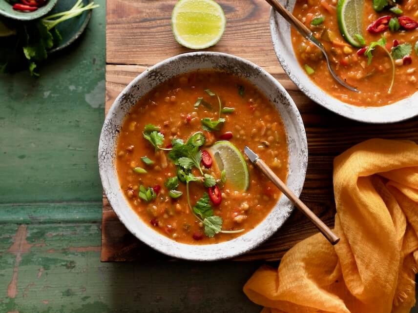 a couple of bowls of food on a table