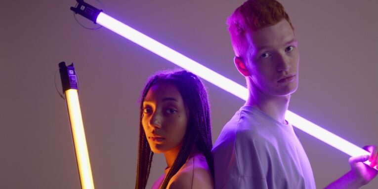 Couple Holding Saber Light FEATURED IMAGE