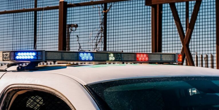 a polarizing topic in political election discussions border patrol vehicle on watch at the mexico united states border in el Paso texas new mexico usa --photo taken on a hot summer day in usa FEATURED IMAGE