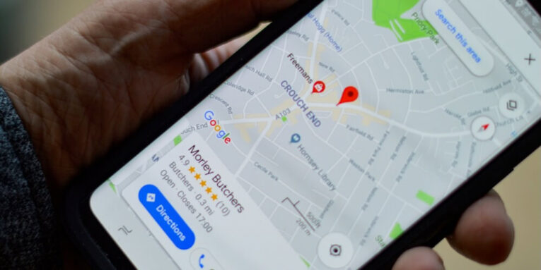 person holding black smartphone using Google Maps FEATURED IMAGE
