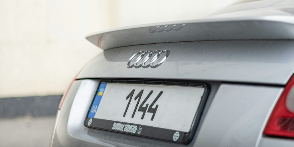 an audi car with its license plate FEATURED IMAGE