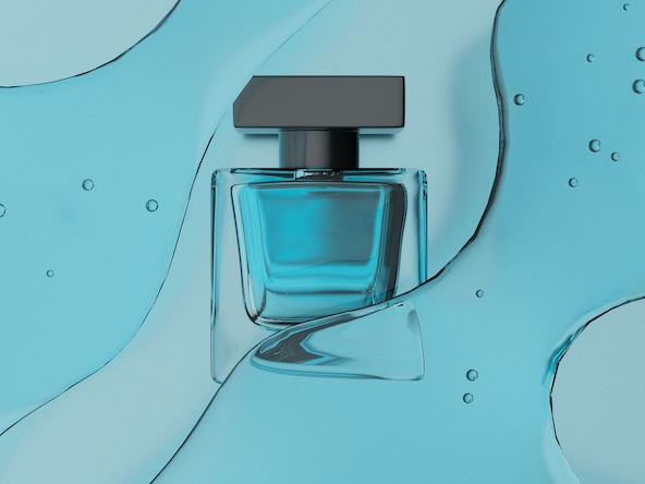 perfume bottle surrounded by a blue liquid texture