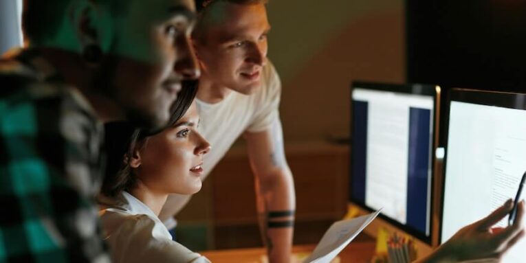 programmers working on software in office team of people coding new app high resolution FEATURED IMAGE