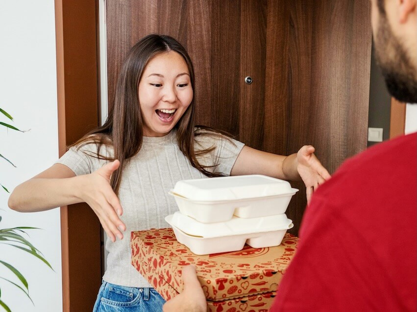food delivery makes a woman very happy