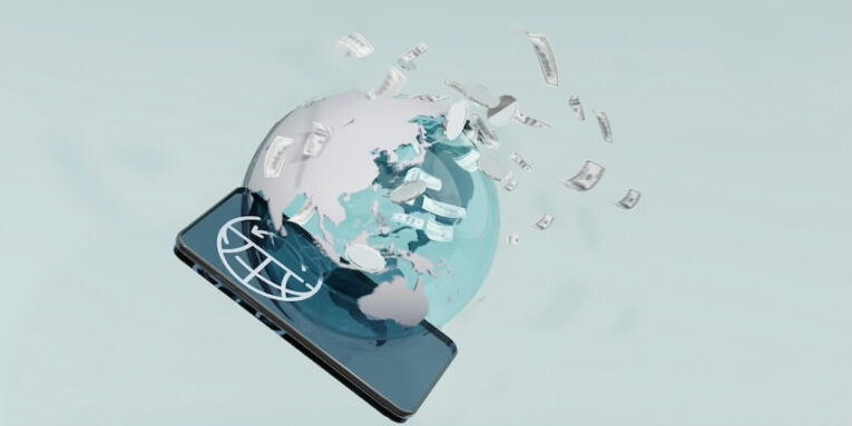 a cell phone flying through the air with a globe on top of it FEATURED IMAGE