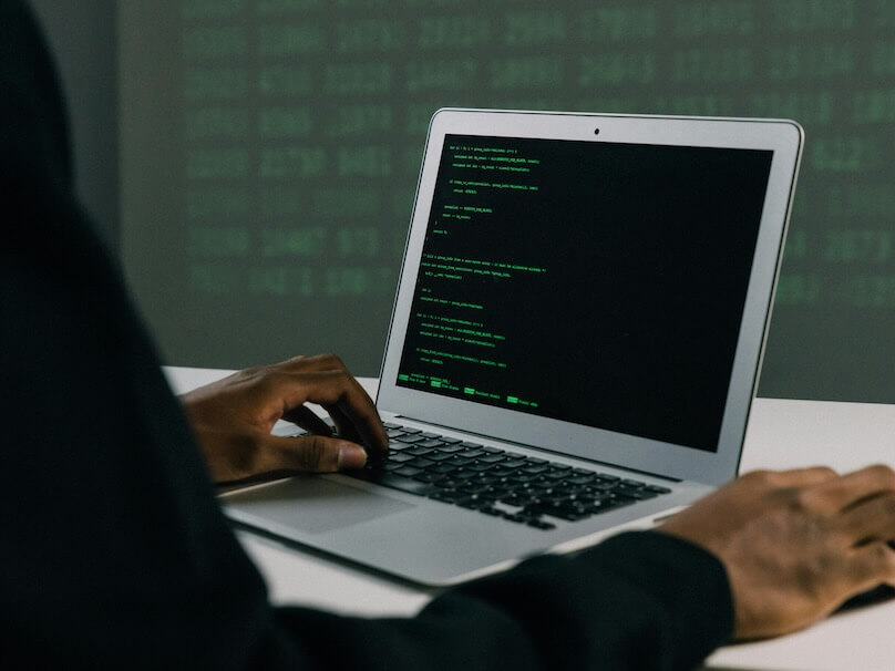 Person Using Macbook Air