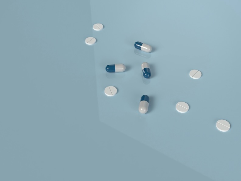a group of pills sitting on top of a table