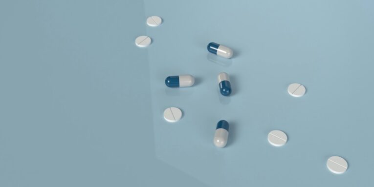 a group of pills sitting on top of a table FEATURED IMAGE