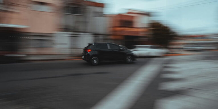 black suv on road during daytime FEATURED IMAGE