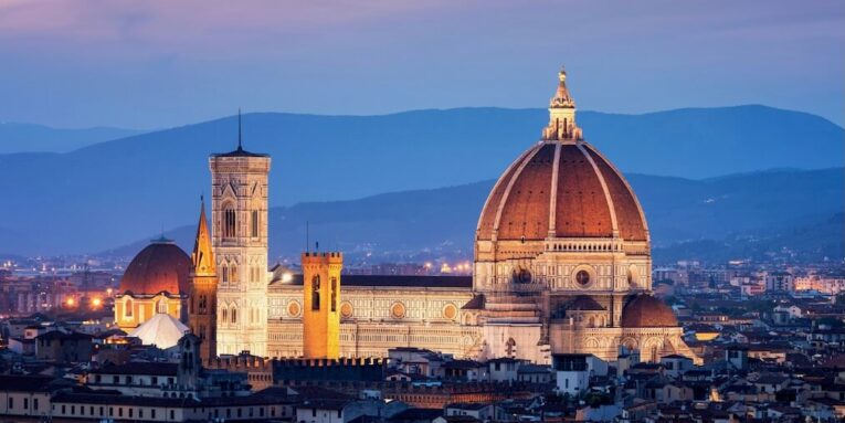 florence cathedral cattedrale di santa Maria del fiore in historic center of florence italy with night panoramic view of the city florence cathedral is major tourist attraction of tuscany italy FEATURED IMAGE