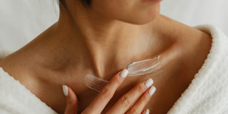 a woman with white nails and a white towel FEATURED IMAGE