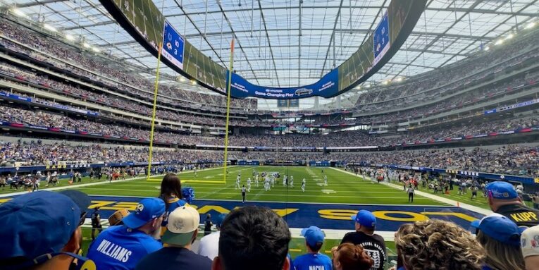 spectators watch a Rams vs Colts NFL football game at SOFI Stadium FEATURED IMAGE