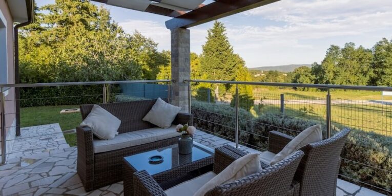 brown wicker chairs and table FEATURED IMAGE