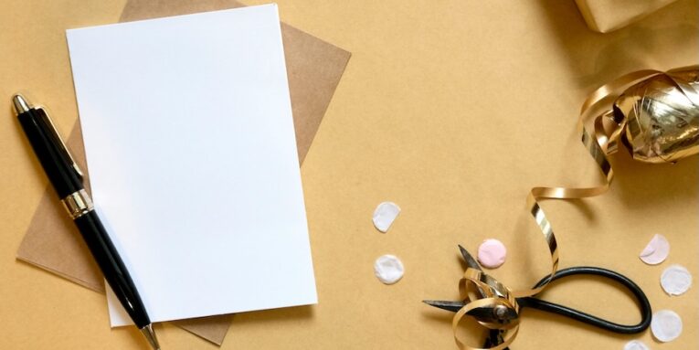 blank card with pen and gift box FEATURED IMAGE