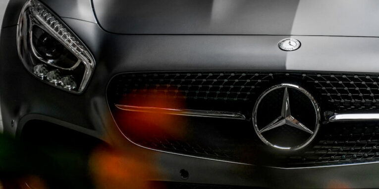 close up photo of mercedez benz vehicle FEATURED IMAGE