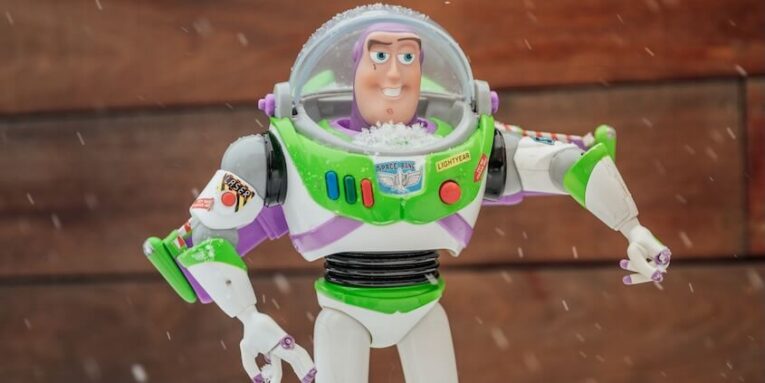 a toy buzz lightyear standing in the snow FEATURE IMAGE