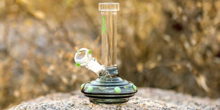 clear glass water bong on gray rock FEATURED IMAGE