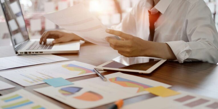 businessman determine ideas planning with documents working concept FEATURED IMAGE