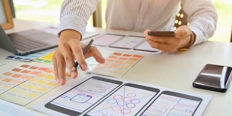 ui designer drawing website ux layout app development FEATURED IMAGE
