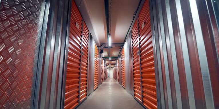 storage containers modern clean lighted secure area with two neat rows of storage containers FEATURED IMAGE