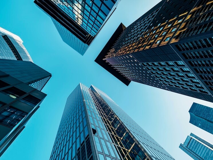 modern bank towers in frankfurt at late afternoon captured in wide angle