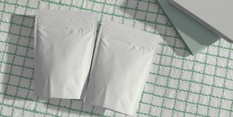 two bags of food sitting on top of a table FEATURED IMAGE