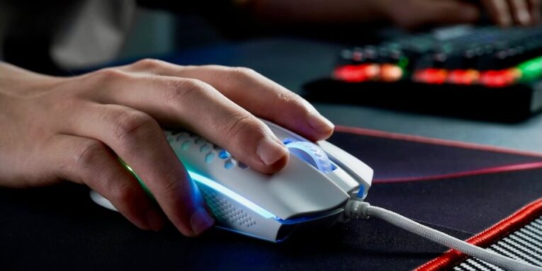 person holding black and gray computer mouse FEATURED IMAGE